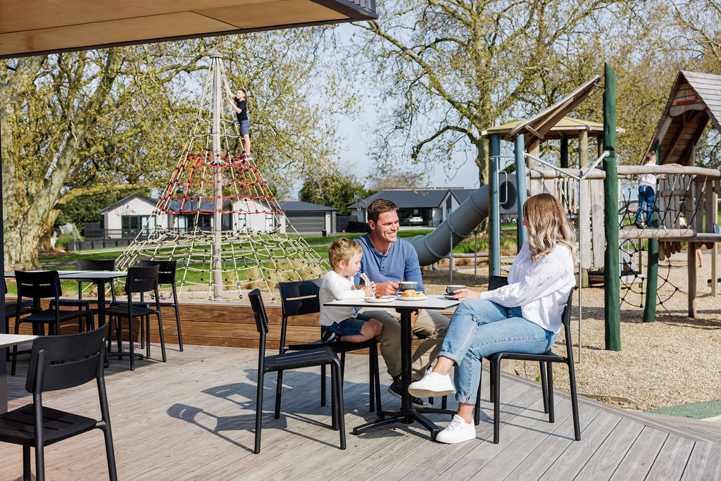 Lockerbie Cafe in Morrinsville — dark metal cladding, timber deck and glazed frontage, photographed by Aaron Radford — view 5